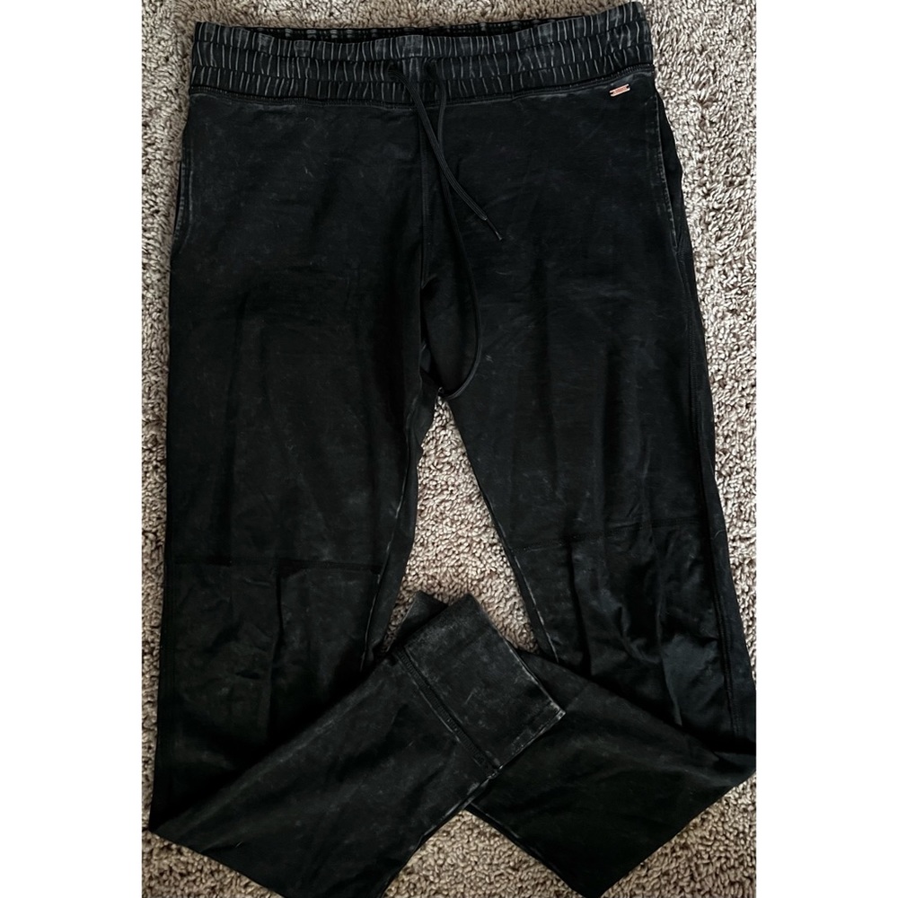 Black yoga leggings with plastic